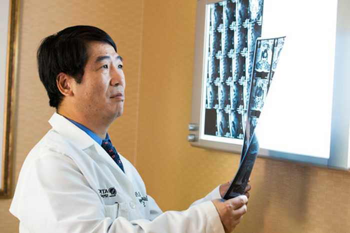 Dr. Kauxian Liu Reviewing Medical Images